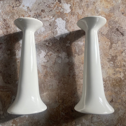 Pair of white ceramic candlesticks