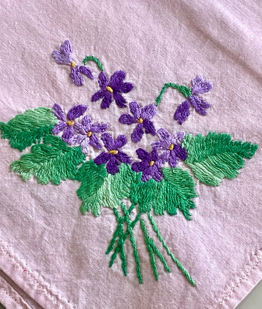 Small square tablecloth in light cotton embroidered with violet flowers